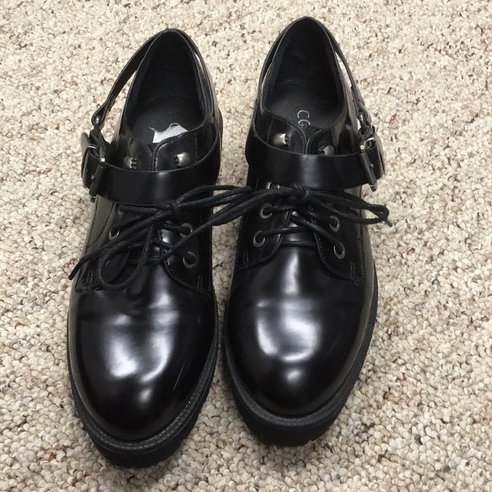 Black creepers with harness detail